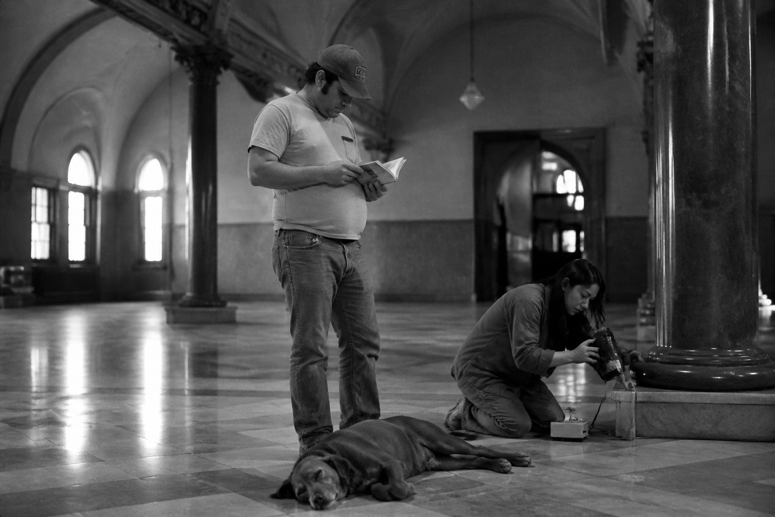 Black-and-white recreation of an investigation scene